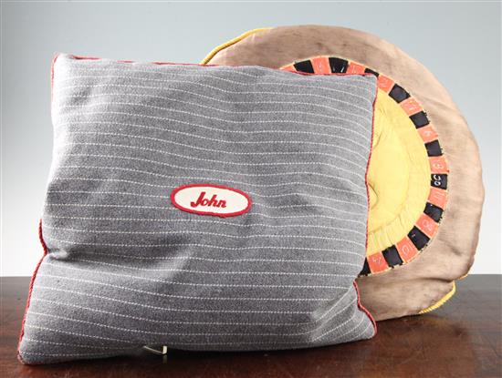 Two scatter cushions, purchased from the Sothebys Elton John sale, largest 18in.